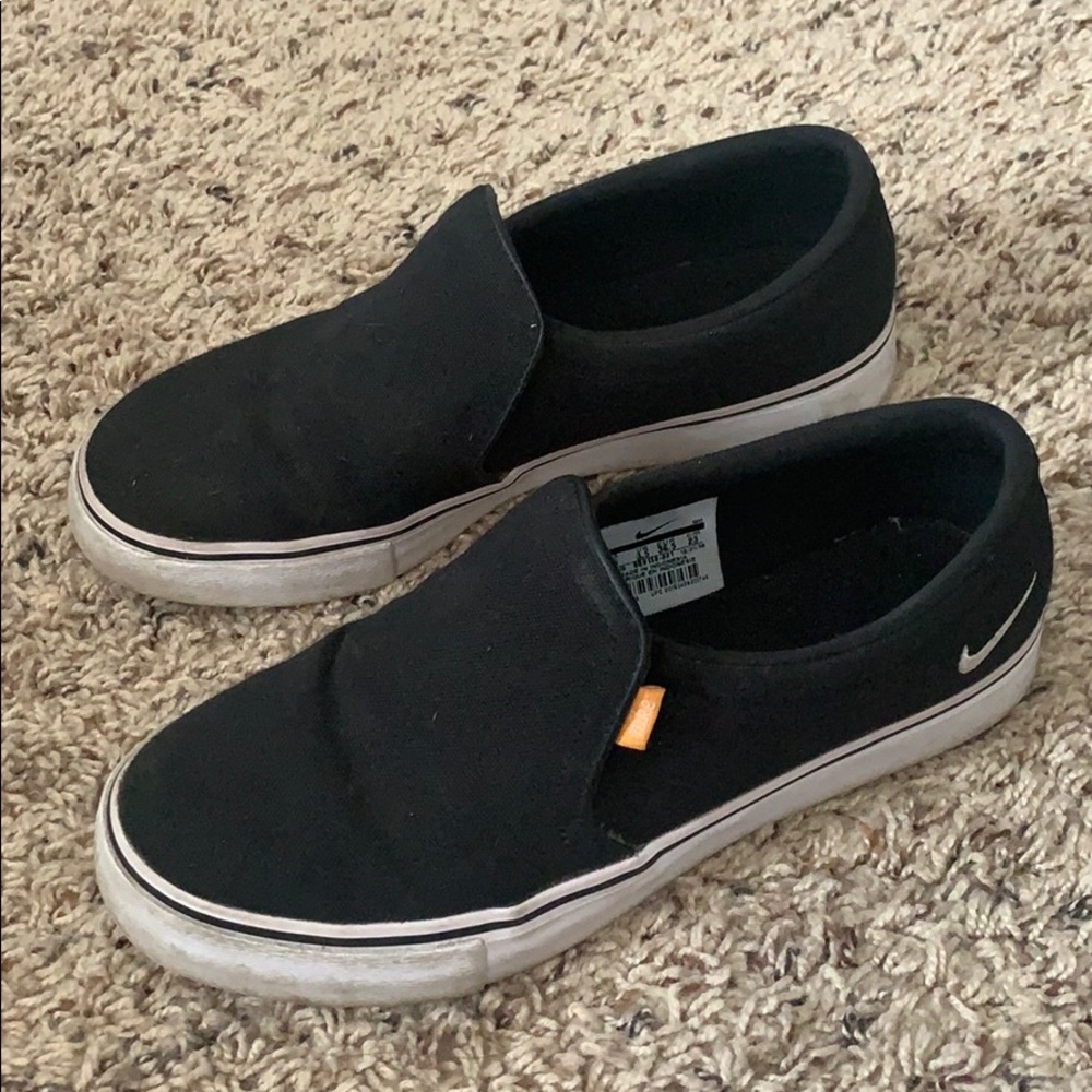 black slip on nike sneakers